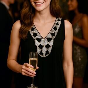 Women's 3X top black shear with silver sequined V-neckline with 
lace, and beads